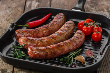 grilled sausages in a pan