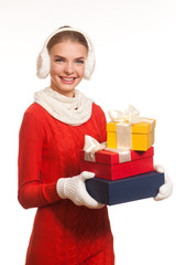 Young girl holding present boxes