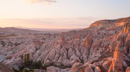 Rolgordijnen mountains and valley in the evening during sunset in Cappadocia © olesyaturchuk