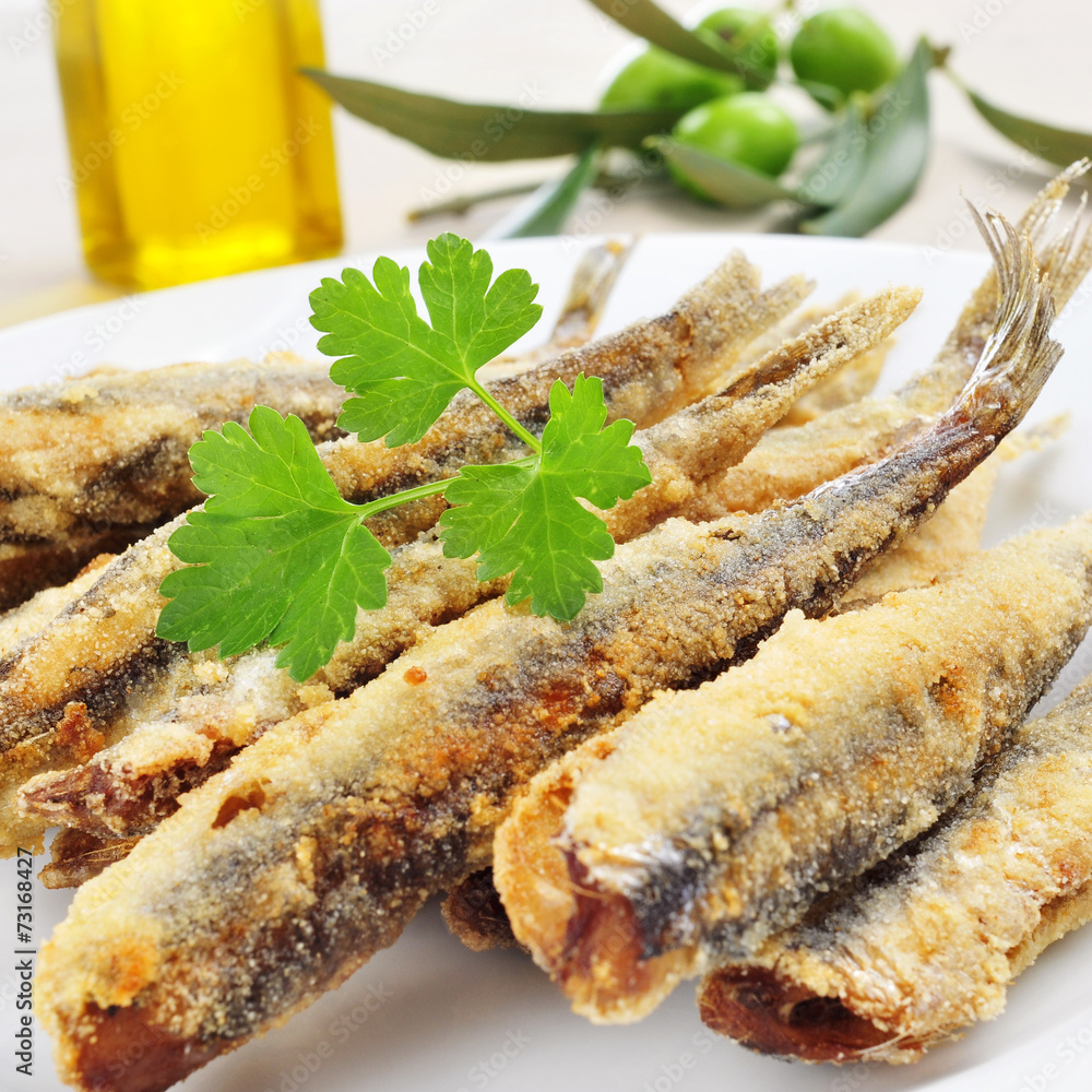 Poster spanish boquerones fritos, battered and fried anchovies typical