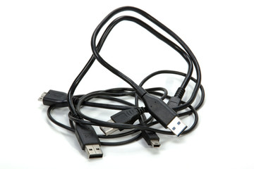 Three Isolaed Intertwined USB Cables on white