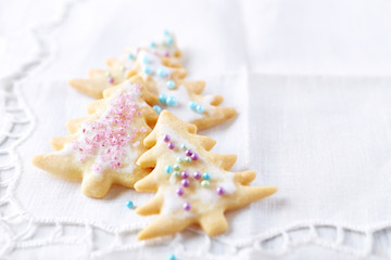 Iced Christmas cookies with sugar pearls