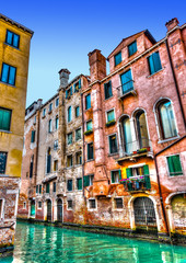 Beautiful view of a canal in Venice Italy. HDR processed