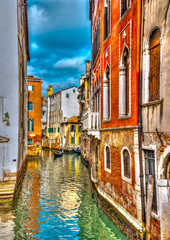 Beautiful view of a canal in Venice Italy. HDR processed