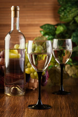 Bottle and glasses of white wine