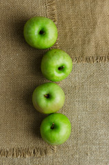 Green apples in a row