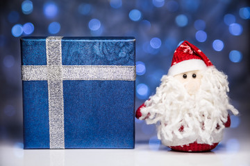 Santa Claus or Father Frost with gift box or present