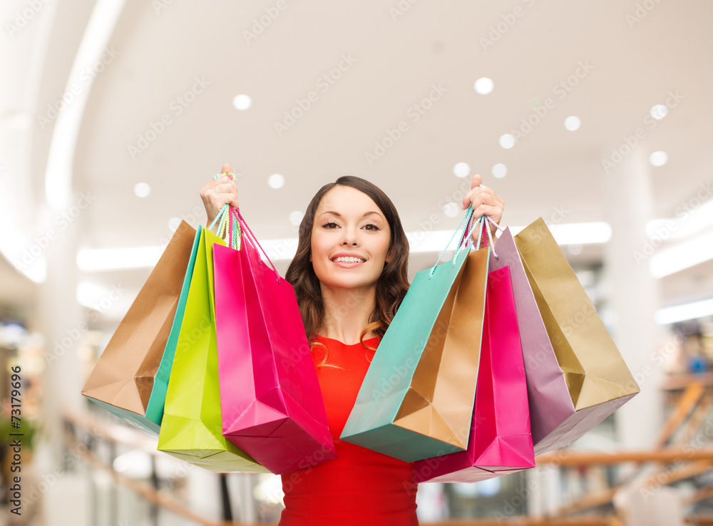 Canvas Prints smiling young woman with shopping bags