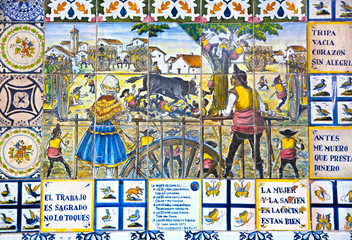 Decorative tiles on Madrid street. National decorative art with 