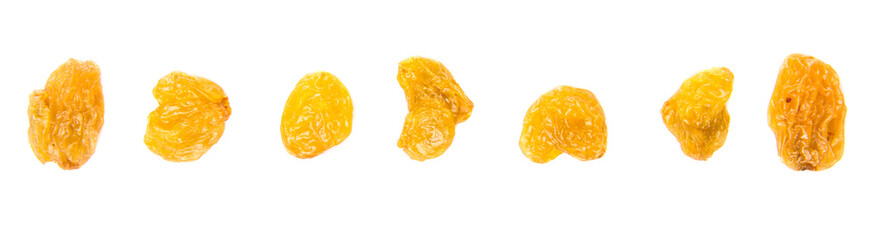 Golden colored dried raisin over white background