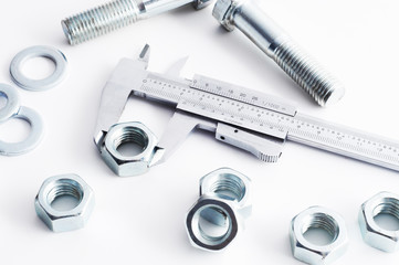 Measurement of steel nut. Measuring with vernier caliper