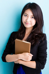 asian businesswoman on blue background