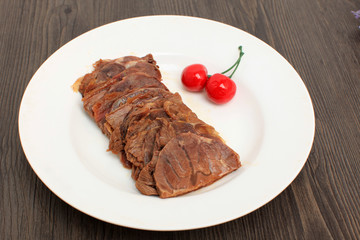 Spicy Beef Jerky on vintage wooden background