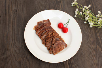 Spicy Beef Jerky on vintage wooden background
