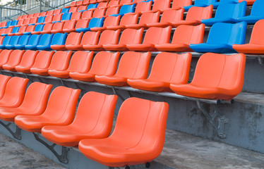 Fototapeta premium orange and blue grandstand chairs