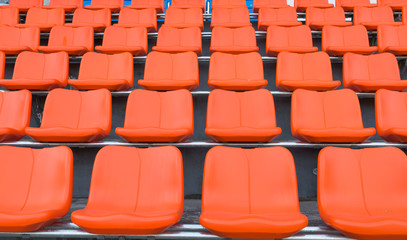 Naklejka premium orange grandstand chairs