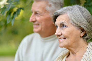 Mature couple in the autumn park
