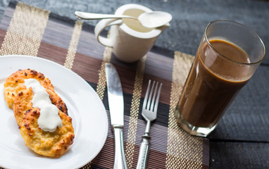 baked cheesecakes with sour cream and coffee with milk, breakfas