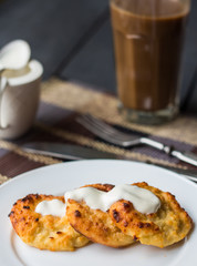 baked cheesecakes with sour cream and coffee with milk, breakfas