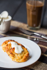 baked cheesecakes with sour cream and coffee with milk, breakfas