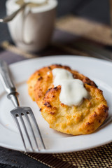 baked cheesecakes with sour cream and coffee with milk, breakfas