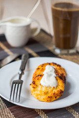 cottage cheese pancakes with sour cream and coffee, breakfast