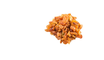 Dried orange colored raisin over white background