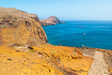 Cliffs and ocean bay view from trekking trail, Madeira island