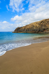 Fototapeta na wymiar Black sand volcanic Prainha beach on coast of Madeira island