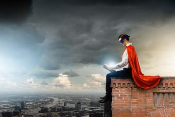 Superman with book