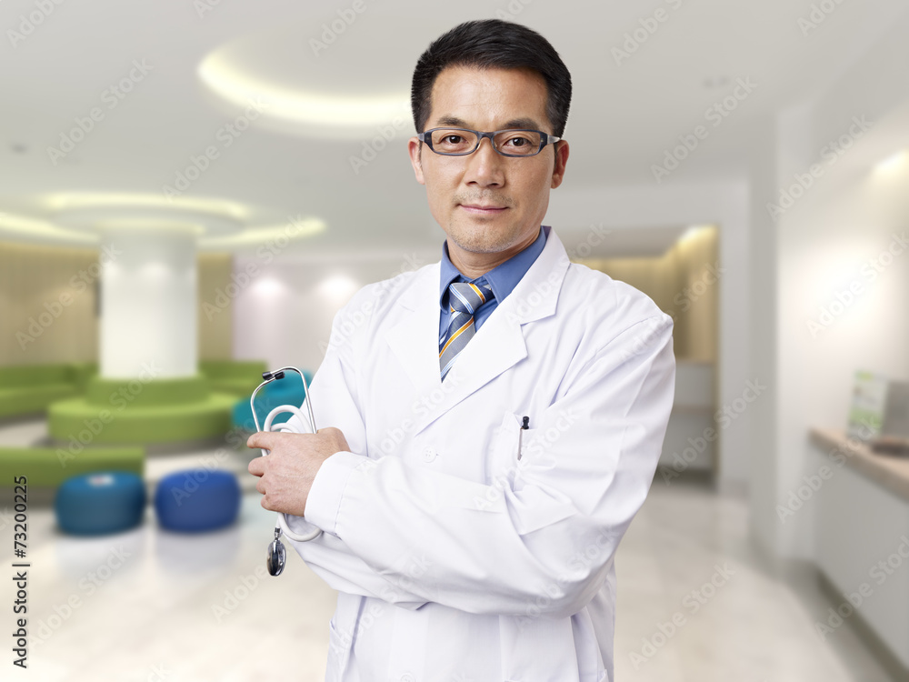 Wall mural asian doctor