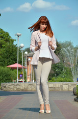 Haired girl in a clean white suit