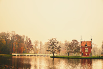 Fototapeta premium Chapel in autumn park