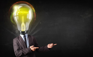 Business man with light bulb head concept