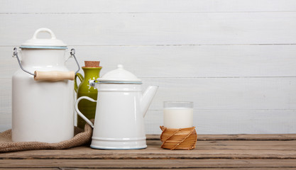 glass of fresh milk old wooden table