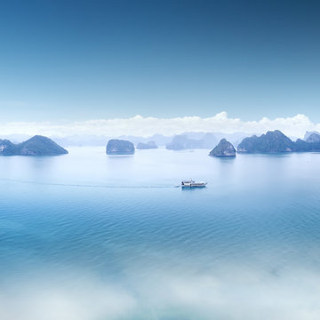 Blue water and sky aerial view panorama of Halong Bay in Vietnam
