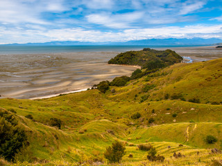 View over Grassland at Puponga bay, South Island, New Zealand