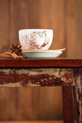 Cup of coffee with sugar on a beautiful rustic background