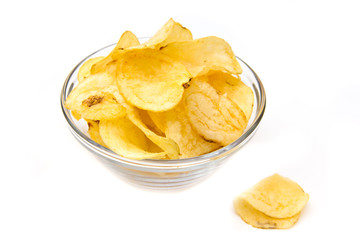 Bowl with potato chips on white background