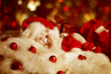 Christmas Baby, New Born Kid Sleeping As Xmas Gift In Santa Hat,