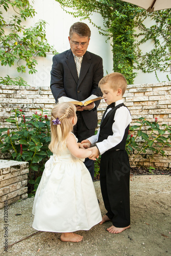 Download "Boy and girl getting married" Stock photo and royalty-free images on Fotolia.com - Pic 73209848