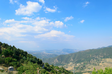 Fototapeta na wymiar Mountain landscape in Basilicata with blue sky and clouds