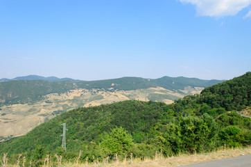 Fototapeta na wymiar Mountain landscape in pietrapertosa on the road side
