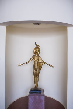 Egyptian statue of the woman gold