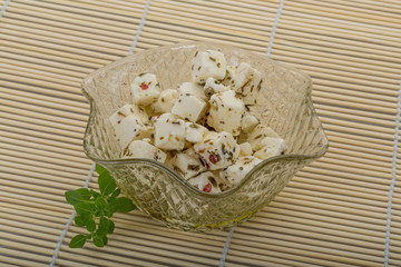 Cheese with spices and oil