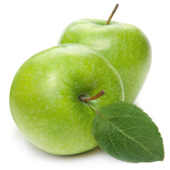Green apple fruits and green leaves isolated on white background