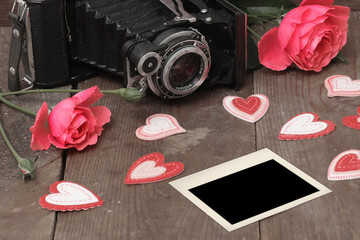 Vintage camera and roses