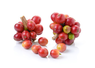ripe coffee beans on white background