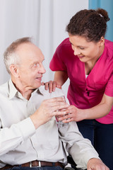 Disabled man drinking water