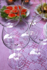 Buffet table with dishware waiting for guests